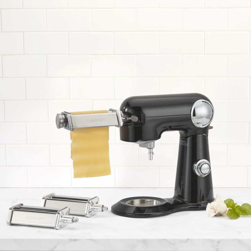 Close-up of Cuisinart PE-50 extruder shaping pasta dough.