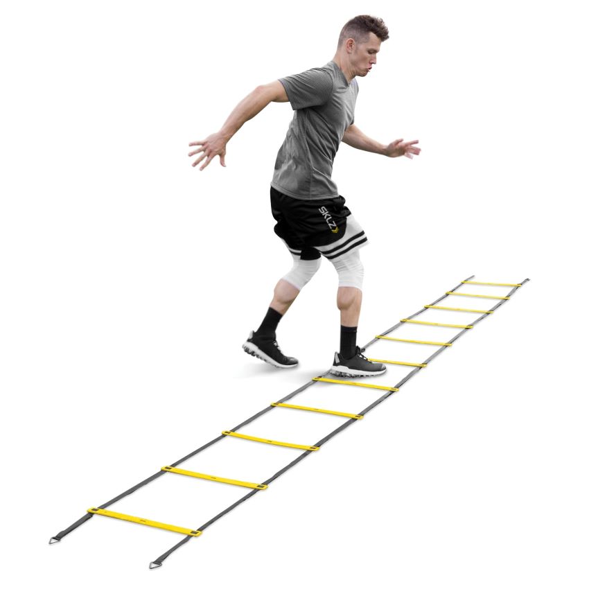 Athlete performing footwork drills using SKLZ agility ladder.