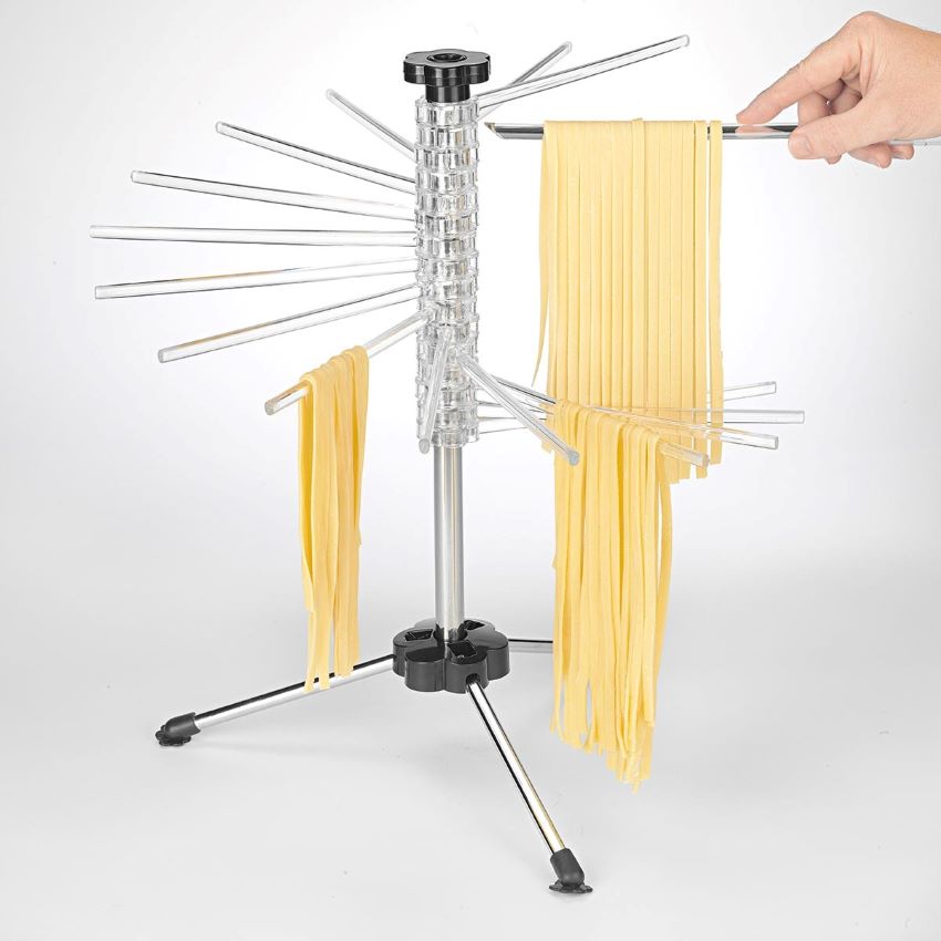 Close-up of KitchenAid KPDR drying rack with hanging fresh pasta