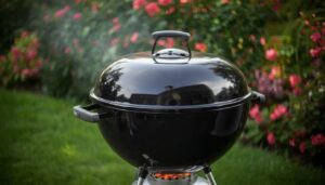 Weber Original Kettle 22-inch charcoal grill with glowing coals and dome lid closed for even heat circulation