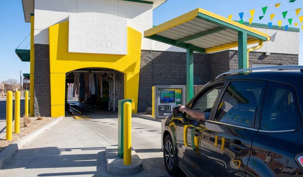 Quick Quack car wash price list showing tier options